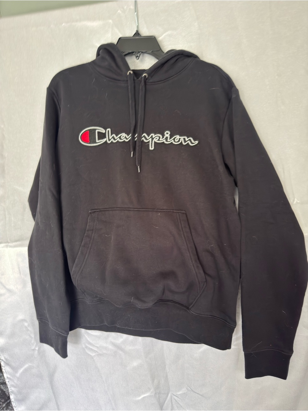 Champion Black Hoodie with Script Logo and Red Accent